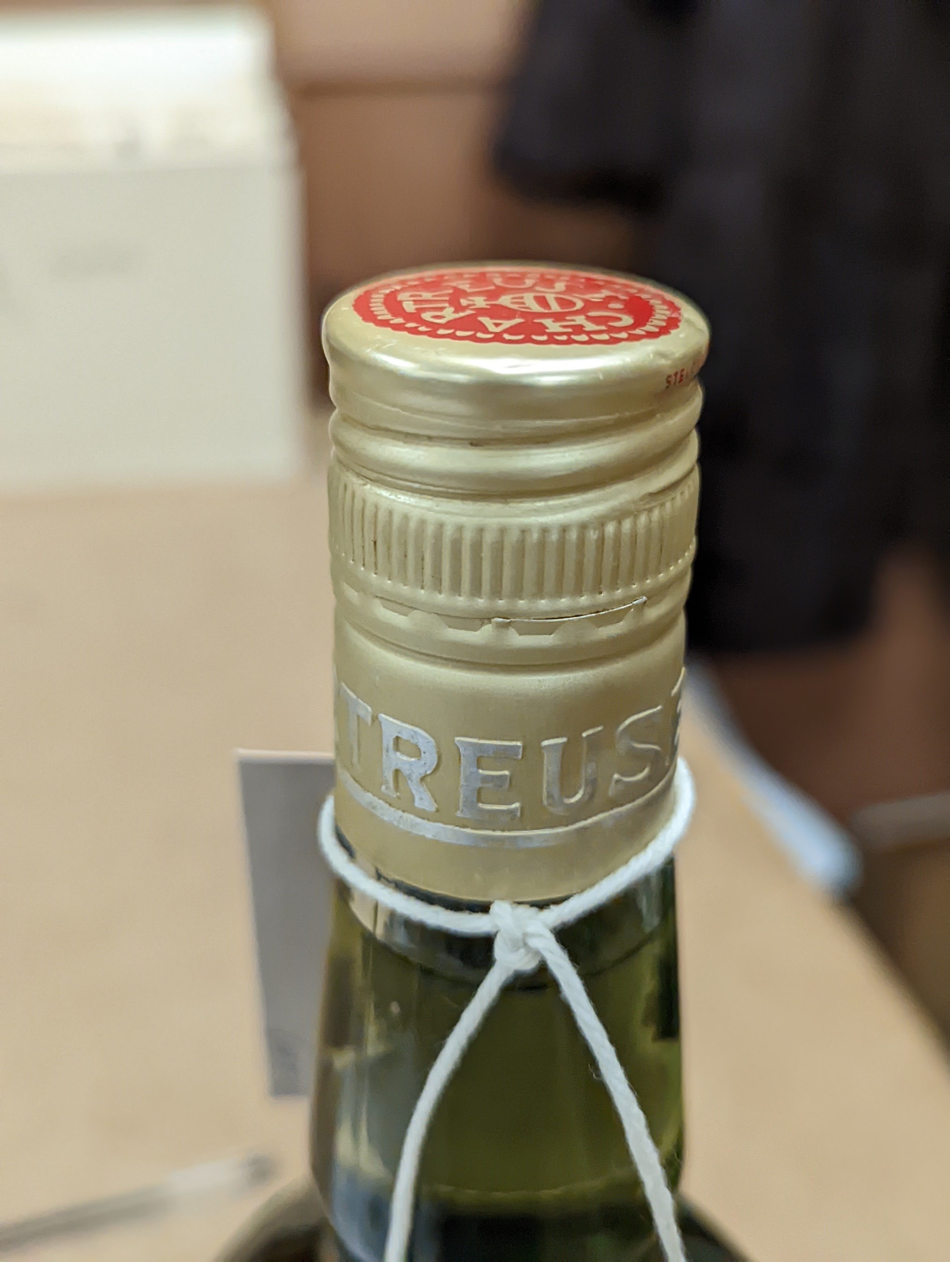 One Chartreuse bottle and ten Chartreuse miniatures